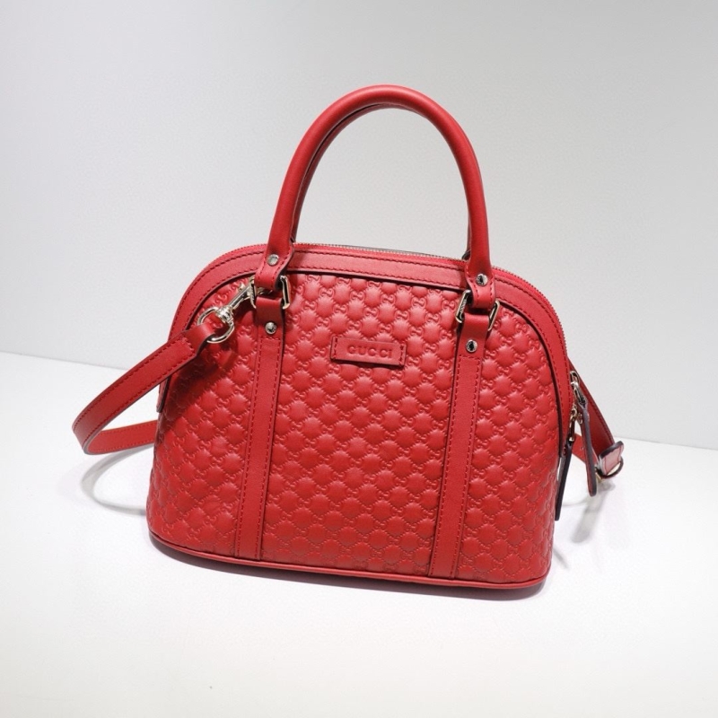 G*u*i top handle bags